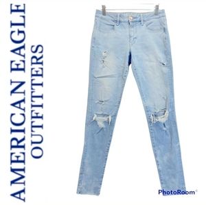 AMERICAN EAGLE LIGHT ACID WASH RIPPED JEGGING JEANS LONG
